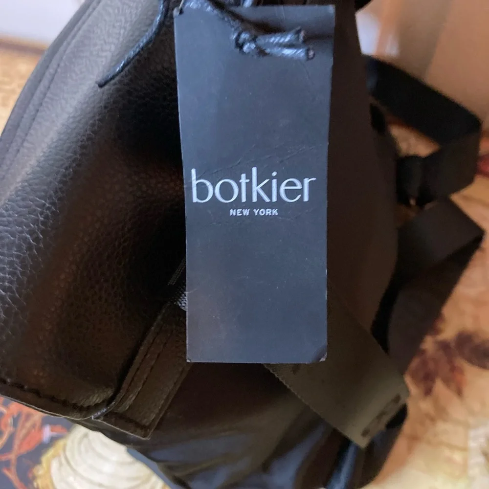 NWT Botkier mini trigger NYLON BACKPACK BLACK WITH GUITAR LIKE LOGO STRAPS